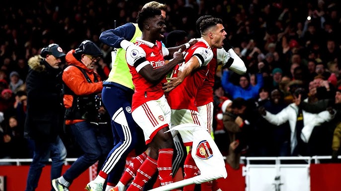 Arsenal players celebrate. Photo Courtesy/You Tube