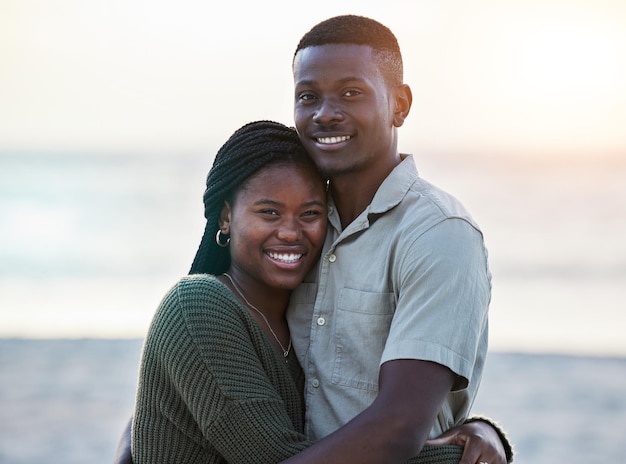 happy-black-couple-portrait-outdoor-beach-with-love-care-commitment-smile-face-young-african-man-woman-together-vacation-holiday-sunset-travel-trip-jamaica_590464-210677-1