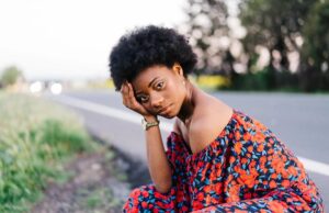 Bride’s Dress Catches Fire Mid-Wedding, What They Found Inside the Gown Was Unbelievable portrait-young-woman-sitting-outdoors