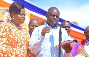 Gladys Wanga’s Husband George Wanga Named New KLB CEO George Wanga Appointed New CEO of Kenya Literature Bureau Summary George Wanga, husband to Homa Bay Governor Gladys Wanga, has been appointed the new CEO of Kenya Literature Bureau (KLB). He met Education PS Julius Bitok, who outlined government expectations. KLB reaffirmed its commitment to producing quality learning materials. Government aims to strengthen competency-based education and ensure equal access to books. PS Bitok praised KLB’s contribution to education reforms. Wanga Takes Over Leadership at KLB George Wanga has officially taken up the role of Chief Executive Officer at the Kenya Literature Bureau. His appointment became public after his meeting with Education Principal Secretary Julius Bitok on Wednesday, November 26. The meeting focused on the direction of the bureau and what the government expects under his leadership. Government Outlines Key Mandate PS Bitok stated that KLB remains a key pillar in the country’s education system, especially in providing learning materials that meet curriculum standards. In his statement, Bitok confirmed the bureau’s renewed commitment to quality. “KLB reaffirmed its commitment to strengthening its mandate of providing high-quality learning materials that support curriculum requirements and ongoing education reforms.” Focus on Competency-Based Learning The government is working to improve access to educational resources, especially as competency-based learning continues to grow. Bitok said that ensuring learners have the right materials remains a top priority. “As we continue enhancing the delivery of competency-based learning, our focus remains on ensuring that every learner has access to relevant, affordable, and high-quality educational resources.” He also thanked KLB for its continued contribution to the Ministry’s goals. “We appreciate KLB’s dedication to fulfilling its role within the Ministry and contributing to our shared goal of improving learning outcomes across the country.” Closing Statement Wanga’s appointment signals a renewed push to strengthen Kenya Literature Bureau’s role in curriculum support. As education reforms continue, his leadership is expected to guide the institution in delivering quality, accessible learning materials for learners nationwide.