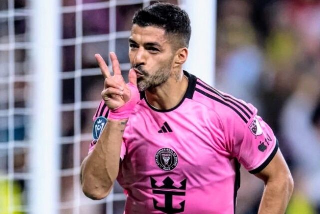 Mukhtasari Luis Suarez played a central role in Inter Miami’s first MLS Cup victory The veteran striker has agreed to continue with the club after contract talks His time in the US has delivered goals, trophies and renewed controversy Key Figure in Historic MLS Cup Win Luis Suarez was instrumental in Inter Miami’s historic 2025 season, scoring 17 goals and providing 17 assists in 50 matches across all competitions. His contributions helped the club lift their first-ever MLS Cup after defeating Vancouver Whitecaps earlier this month. The title marked a major milestone for the MLS side and capped off a strong campaign that also saw Miami dominate for long spells of the season. Reunion With Former Barcelona Stars Suarez joined Inter Miami ahead of the 2024 season, reuniting with long-time friends and former Barcelona teammates Lionel Messi, Sergio Busquets and Jordi Alba. The quartet brought experience and star power that quickly transformed the club into title contenders. While Busquets and Alba chose to retire following the MLS Cup triumph, Suarez decided to extend his stay in Miami after briefly being out of contract. He will continue playing alongside Messi, who committed his future to the club until 2028. Experience Still Paying Off at 38 The former Uruguay international, who turns 39 next month, has shown that age has not dulled his influence. In addition to the MLS Cup, Suarez also helped Miami win the Supporters’ Shield in his first season, underlining his value both as a scorer and a creator. His leadership and attacking instincts have remained key assets for the team as they look to stay competitive in domestic and regional competitions. Familiar Controversy Follows Him Despite his strong performances, Suarez’s time in the United States has not been without controversy. In August, he received a nine-match suspension for spitting at a Seattle Sounders staff member following Inter Miami’s League Cup final loss. The incident added to a long disciplinary history that includes an eight-game ban in 2011 for racially abusing Manchester United defender Patrice Evra, as well as multiple suspensions for biting opponents during spells with Ajax, Liverpool and the Uruguay national team. Miami Add More Experience Inter Miami, co-owned by former England captain David Beckham, have also continued to strengthen their squad. This week, the club confirmed the signing of former Tottenham Hotspur and Real Madrid left-back Sergio Reguilon on a free transfer. The move signals Miami’s intention to build on their success and remain among the strongest teams in Major League Soccer.