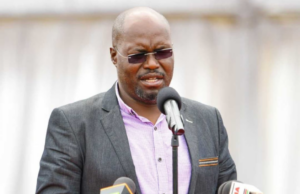 From Narok to Emurua Dikirr: The Rise of Johana Ng’eno Johana Ngeno grew up in rural Narok County, valuing education despite limited access. He earned degrees in international law and studies, including an LL.B from Mount Kenya University and a Master’s from the University of Nairobi. Ngeno served as ADC Director, then became Emurua Dikirr MP in 2013, re-elected in 2017 and 2022. He championed education, conflict resolution, and community development, including bursaries and school transport. Ngeno faced legal challenges in 2020 over incitement charges linked to Mau Forest protests. He died in a helicopter crash in Nandi County while engaged in community and cultural activities. Early Life and Education Born on December 12, 1972, Johana Ngeno grew up in Narok County, where schooling was scarce but highly valued. He attended Mogondo Primary School before moving to Maseno National School for secondary education. Early exposure to local hardships inspired his desire to serve his community. Pursuing higher education, Ngeno studied international law at Kyiv TSN University in Ukraine. On returning to Kenya, he earned an LL.B from Mount Kenya University and a Master of Arts in International Studies from the University of Nairobi. His academic background fueled his work in law, governance, and community development. Public Service and Parliamentary Career Before entering elective politics, Ngeno was Director at the Agricultural Development Corporation (ADC) from 2008 to 2012. The role offered experience in project management and national development, laying the groundwork for his future in Parliament. In March 2013, he won the Emurua Dikirr parliamentary seat, retaining it in 2017 and 2022. In the National Assembly, he chaired the Housing Committee and served on key committees, including Justice and Legal Affairs, Public Investments, and the NG-CDF Committee. Community Engagement and Development Initiatives Ngeno’s impact extended beyond legislation. He provided school buses and bursaries, ensuring access to education for students in remote areas. He resolved local disputes, such as transferring land title deeds to the family of the late Chumeek, allowing dignified burials. He also advocated for security, supporting KDF deployment during cross-border tensions in Narok County. Ngeno encouraged youth participation in governance, promoting peace and inclusive development. Legal Challenges In September 2020, Ngeno was arrested and charged with incitement after public statements during protests over Mau Forest evictions. He was detained briefly at Nakuru GK Prison and released on bond, with the court restricting him from making potentially inflammatory comments. The case highlighted the delicate balance between leadership and national unrest in politically sensitive areas. Final Days and Legacy Tragically, Ngeno was among six people killed in a helicopter crash at Chepkiep, Mosop Constituency, Nandi County. At the time, he was actively participating in community and cultural activities, including celebrating artist Kim Kim’s 35th anniversary and assisting in a Mara River rescue operation. Throughout his career, Ngeno was viewed as a practical problem-solver, mentor, and advocate for justice. His work in education, legal reforms, and community development leaves a lasting imprint on Emurua Dikirr Constituents.