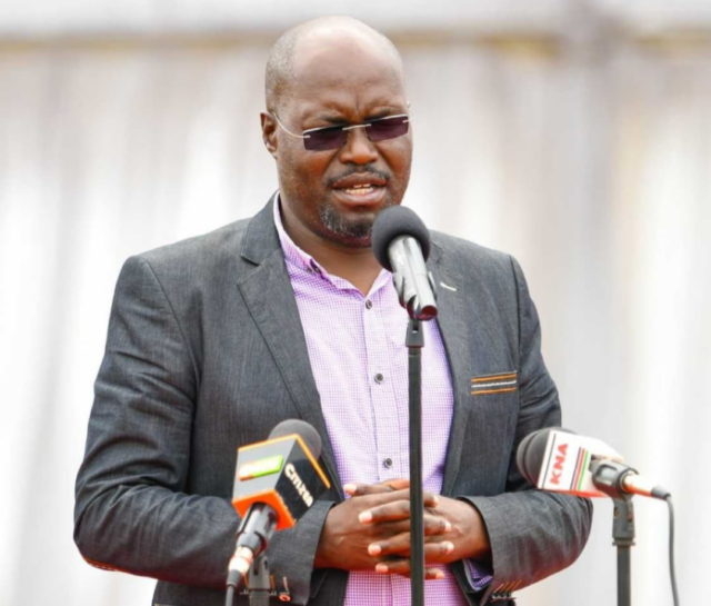 Johana Ngeno grew up in rural Narok County, valuing education despite limited access. He earned degrees in international law and studies, including an LL.B from Mount Kenya University and a Master’s from the University of Nairobi. Ngeno served as ADC Director, then became Emurua Dikirr MP in 2013, re-elected in 2017 and 2022. He championed education, conflict resolution, and community development, including bursaries and school transport. Ngeno faced legal challenges in 2020 over incitement charges linked to Mau Forest protests. He died in a helicopter crash in Nandi County while engaged in community and cultural activities. Early Life and Education Born on December 12, 1972, Johana Ngeno grew up in Narok County, where schooling was scarce but highly valued. He attended Mogondo Primary School before moving to Maseno National School for secondary education. Early exposure to local hardships inspired his desire to serve his community. Pursuing higher education, Ngeno studied international law at Kyiv TSN University in Ukraine. On returning to Kenya, he earned an LL.B from Mount Kenya University and a Master of Arts in International Studies from the University of Nairobi. His academic background fueled his work in law, governance, and community development. Public Service and Parliamentary Career Before entering elective politics, Ngeno was Director at the Agricultural Development Corporation (ADC) from 2008 to 2012. The role offered experience in project management and national development, laying the groundwork for his future in Parliament. In March 2013, he won the Emurua Dikirr parliamentary seat, retaining it in 2017 and 2022. In the National Assembly, he chaired the Housing Committee and served on key committees, including Justice and Legal Affairs, Public Investments, and the NG-CDF Committee. Community Engagement and Development Initiatives Ngeno’s impact extended beyond legislation. He provided school buses and bursaries, ensuring access to education for students in remote areas. He resolved local disputes, such as transferring land title deeds to the family of the late Chumeek, allowing dignified burials. He also advocated for security, supporting KDF deployment during cross-border tensions in Narok County. Ngeno encouraged youth participation in governance, promoting peace and inclusive development. Legal Challenges In September 2020, Ngeno was arrested and charged with incitement after public statements during protests over Mau Forest evictions. He was detained briefly at Nakuru GK Prison and released on bond, with the court restricting him from making potentially inflammatory comments. The case highlighted the delicate balance between leadership and national unrest in politically sensitive areas. Final Days and Legacy Tragically, Ngeno was among six people killed in a helicopter crash at Chepkiep, Mosop Constituency, Nandi County. At the time, he was actively participating in community and cultural activities, including celebrating artist Kim Kim’s 35th anniversary and assisting in a Mara River rescue operation. Throughout his career, Ngeno was viewed as a practical problem-solver, mentor, and advocate for justice. His work in education, legal reforms, and community development leaves a lasting imprint on Emurua Dikirr Constituents.