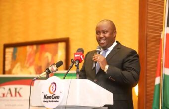 Kenya May Need 1,000MW of Battery Storage as Power Demand Climbs Principal Secretary Alex Wachira speaking at the Kenya Energy Transition Forum 2026 Image Credits: Ministry of Energy and Petroleum / File Photo